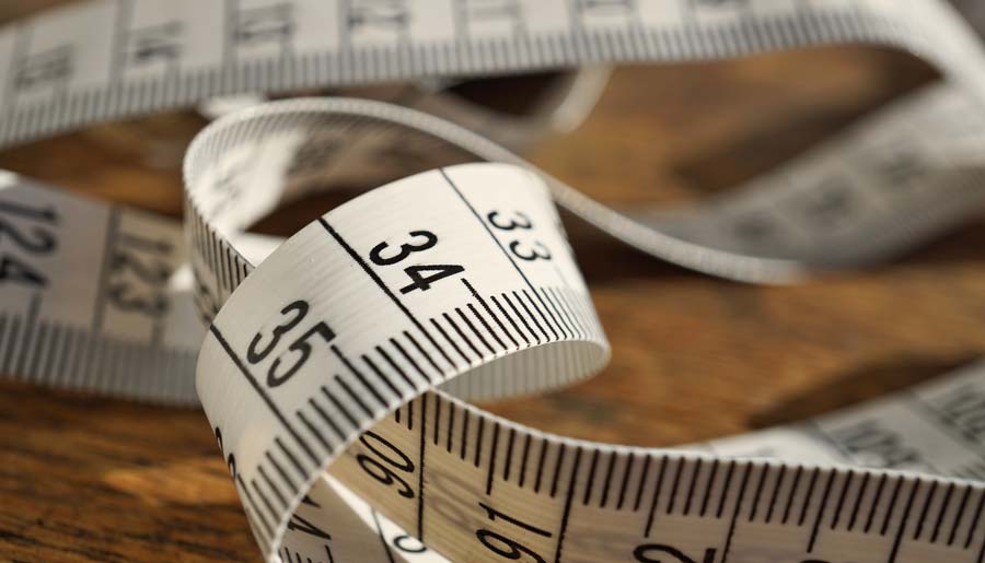 Tape measure for measuring metres and feet